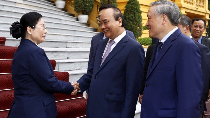 State President welcomes Laos Supreme Court leader in Hanoi